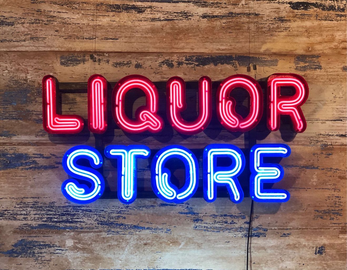 Neon Liquor Store Sign Kemp London Bespoke neon signs and prop hire.